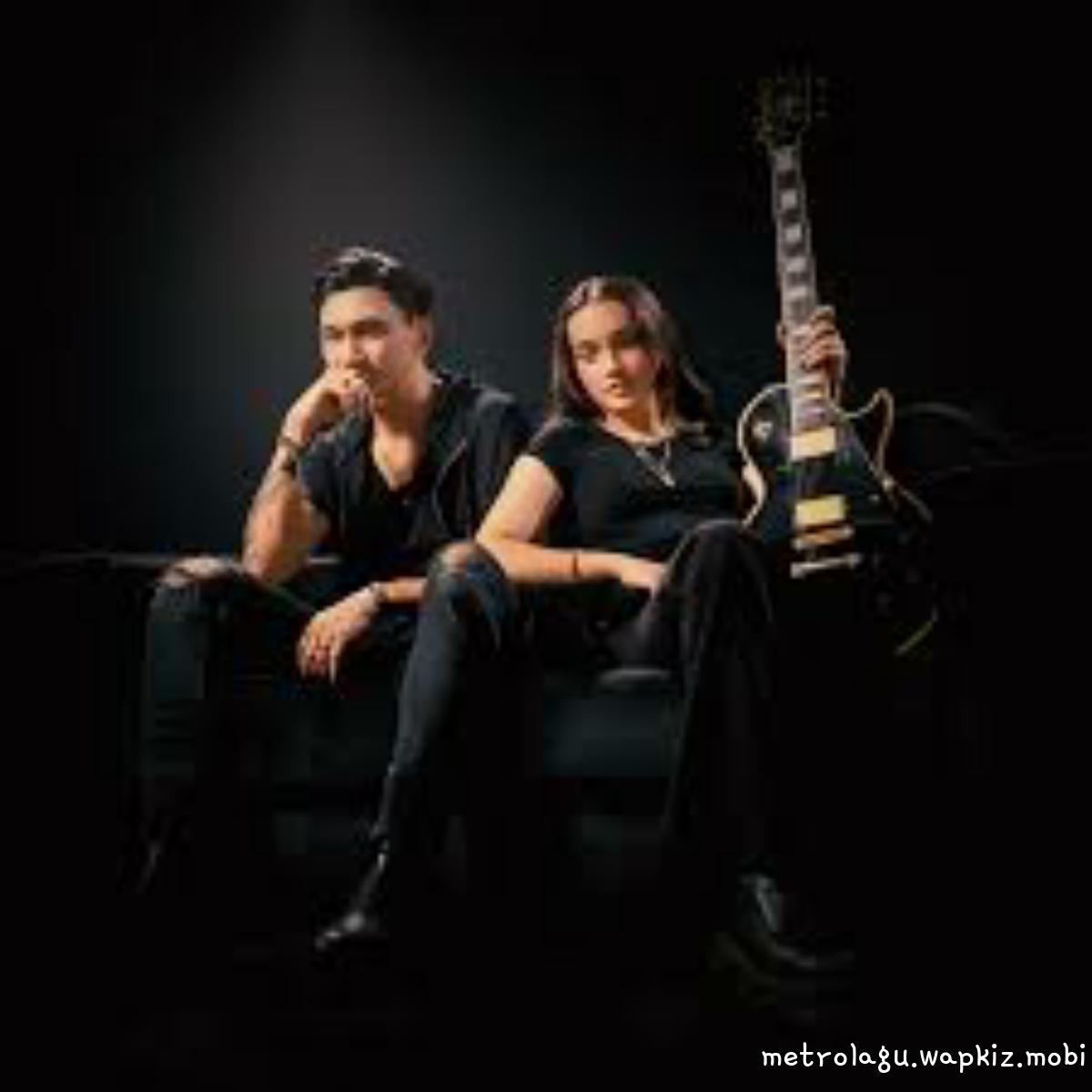 Anji Ft Joey Penny - Lelah Dilatih Rindu cover art on Wallkpop