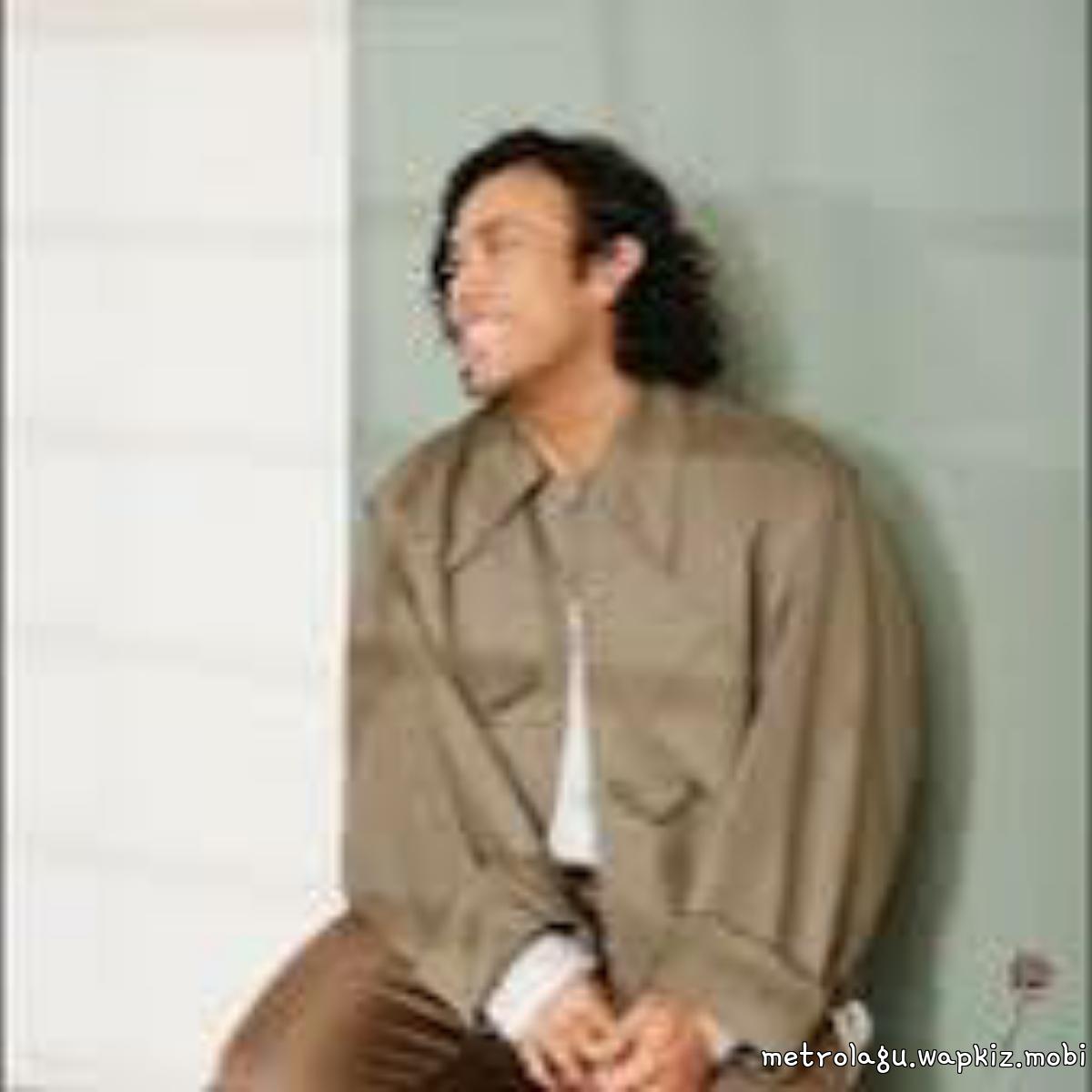 Eros Tjokro - Sama Sama Mau cover art on Wallkpop